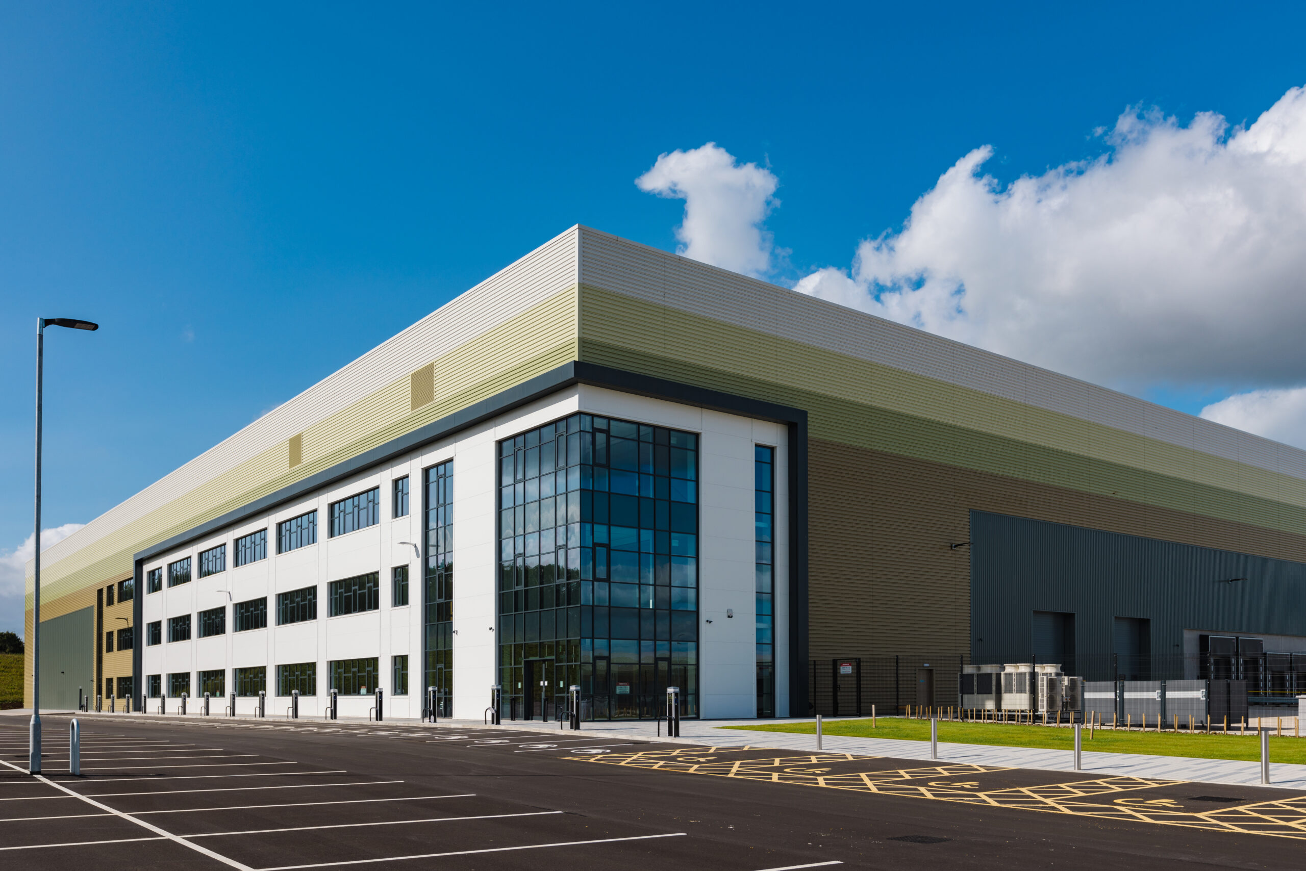 Exterior view of a large industrial unit on a sunny day